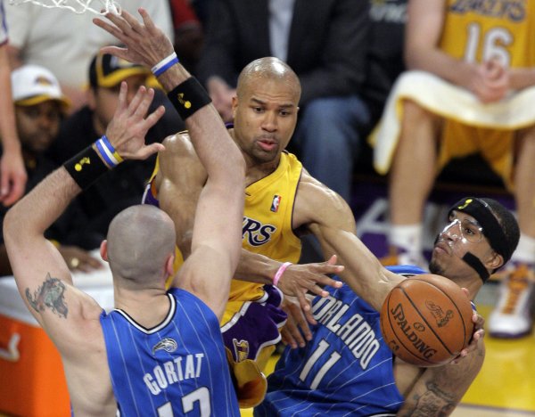 Fisher: I m lucky to be able to play for the Lakers for 13 years. Wearing a purple gold jersey was my childhood dream